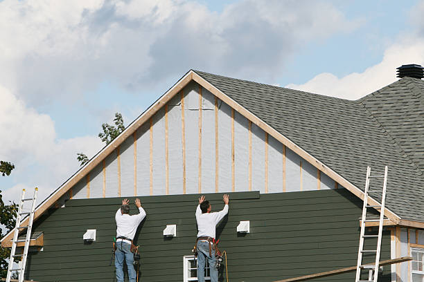 Professional Siding technician working in Cologne, MN